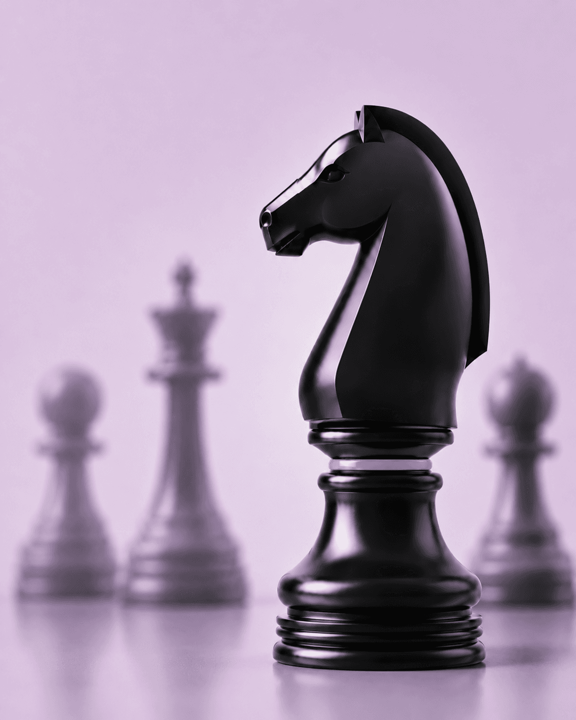 A black chess knight standing among blurred chess pieces — the Agilitas mark of agility